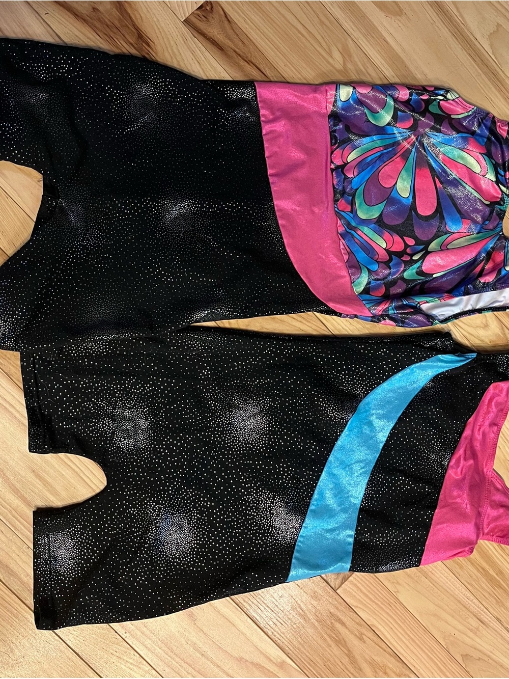 Girls Black Sparkle One-Piece with Pink & Blue Accent